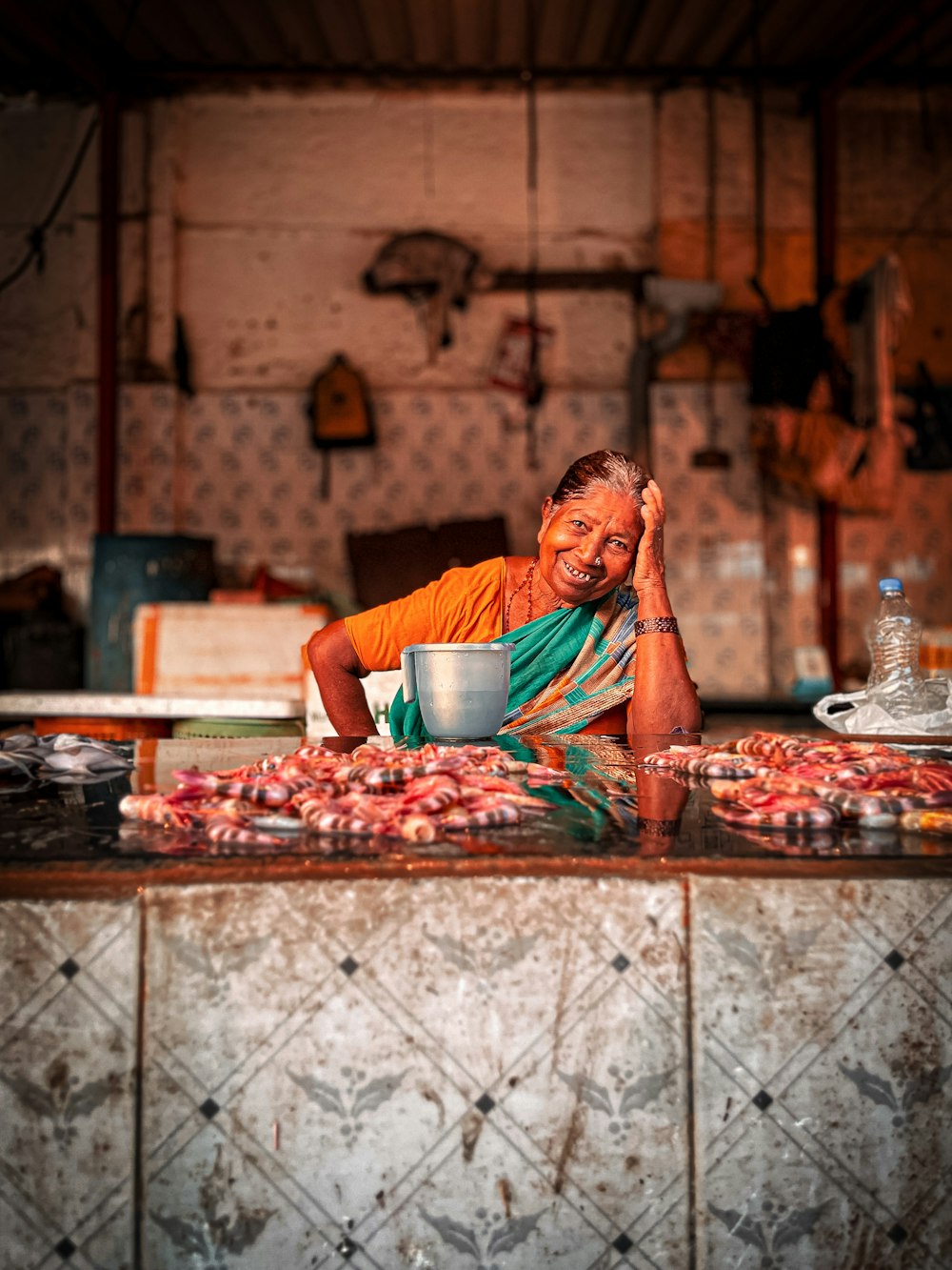 a man sitting at a table with a bowl of food