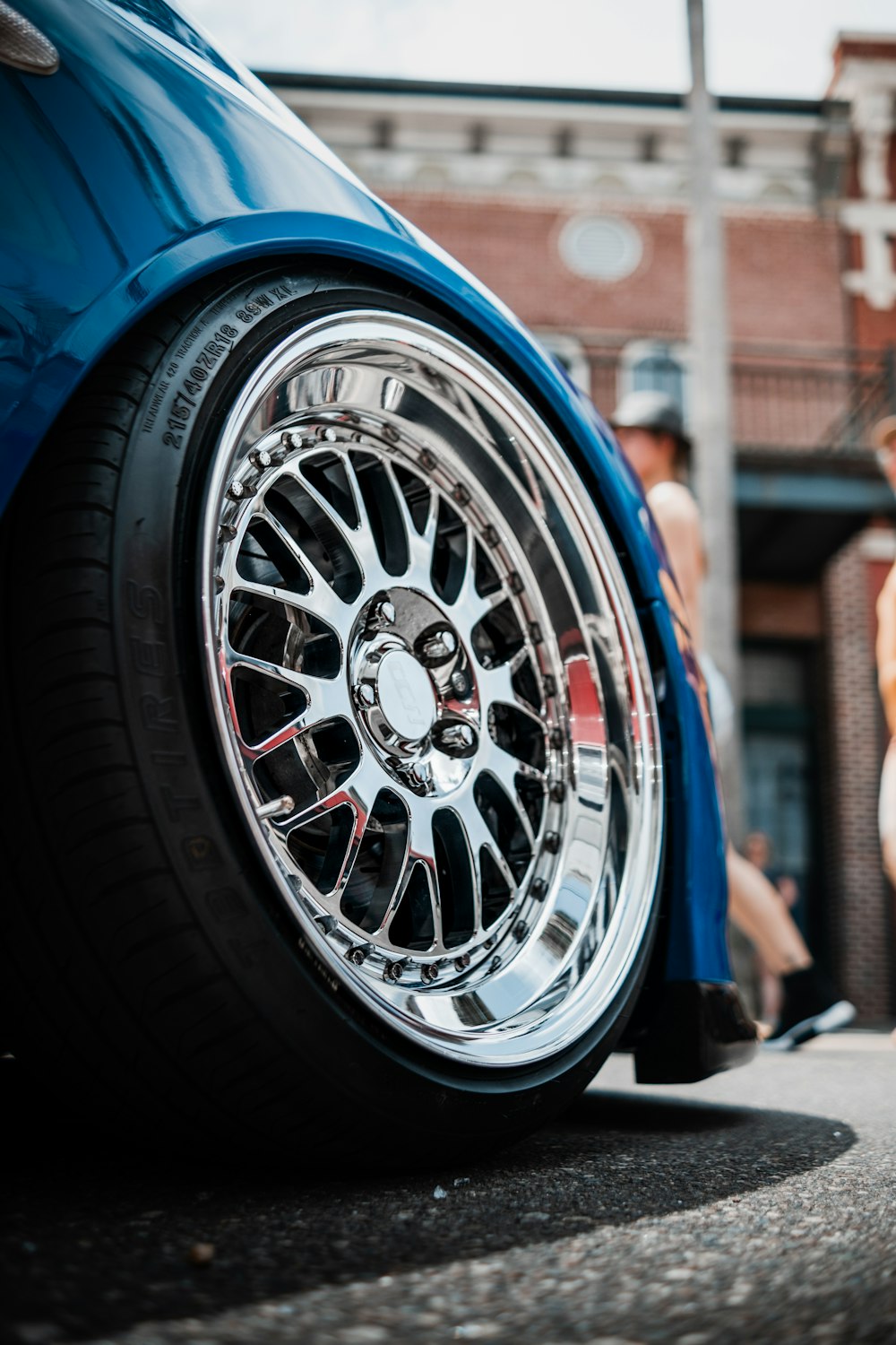 a close up of a car tire on a street