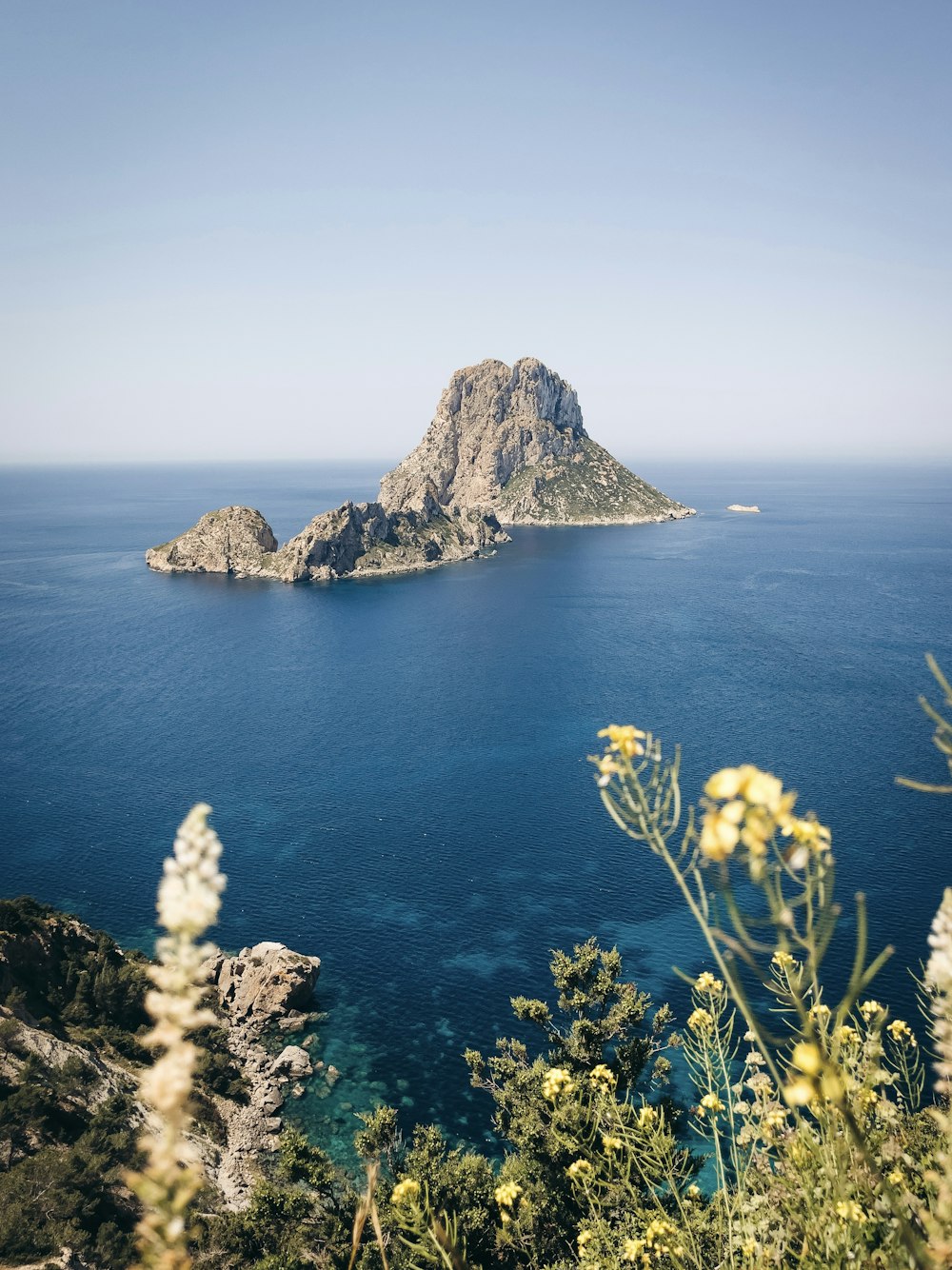 a small island in the middle of a body of water