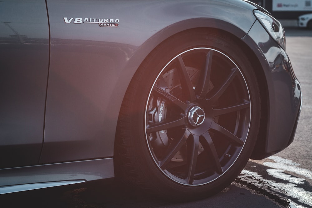 a close up of a wheel on a car