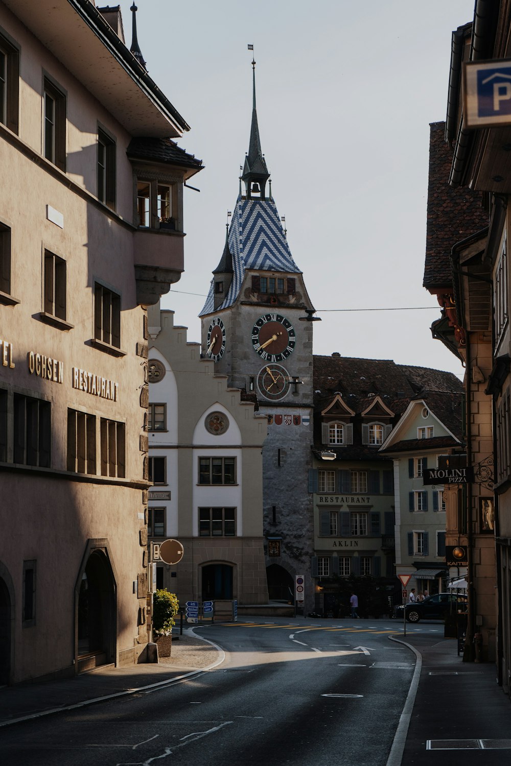 a clock tower on the side of a building