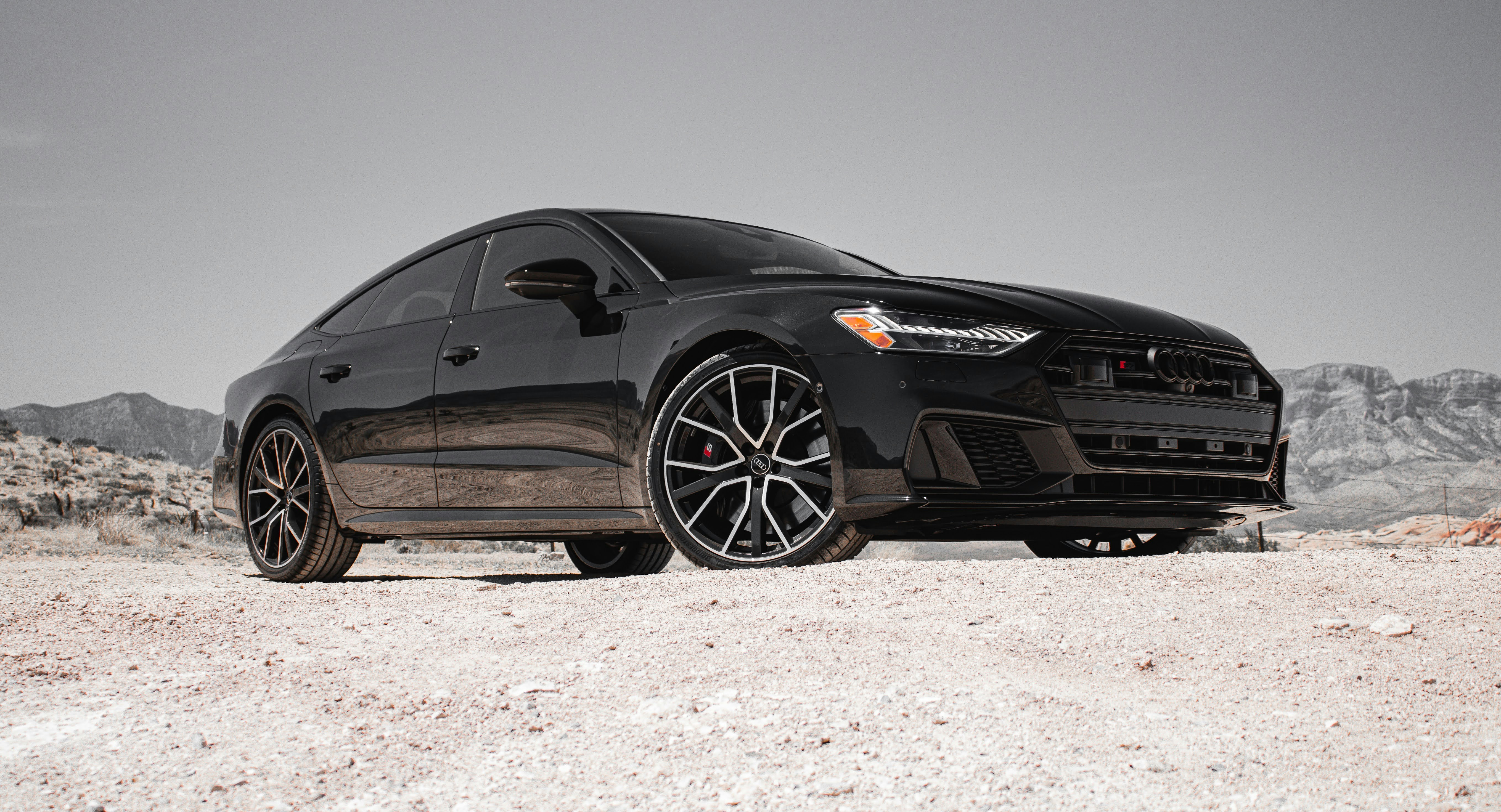 Black sports car in desert