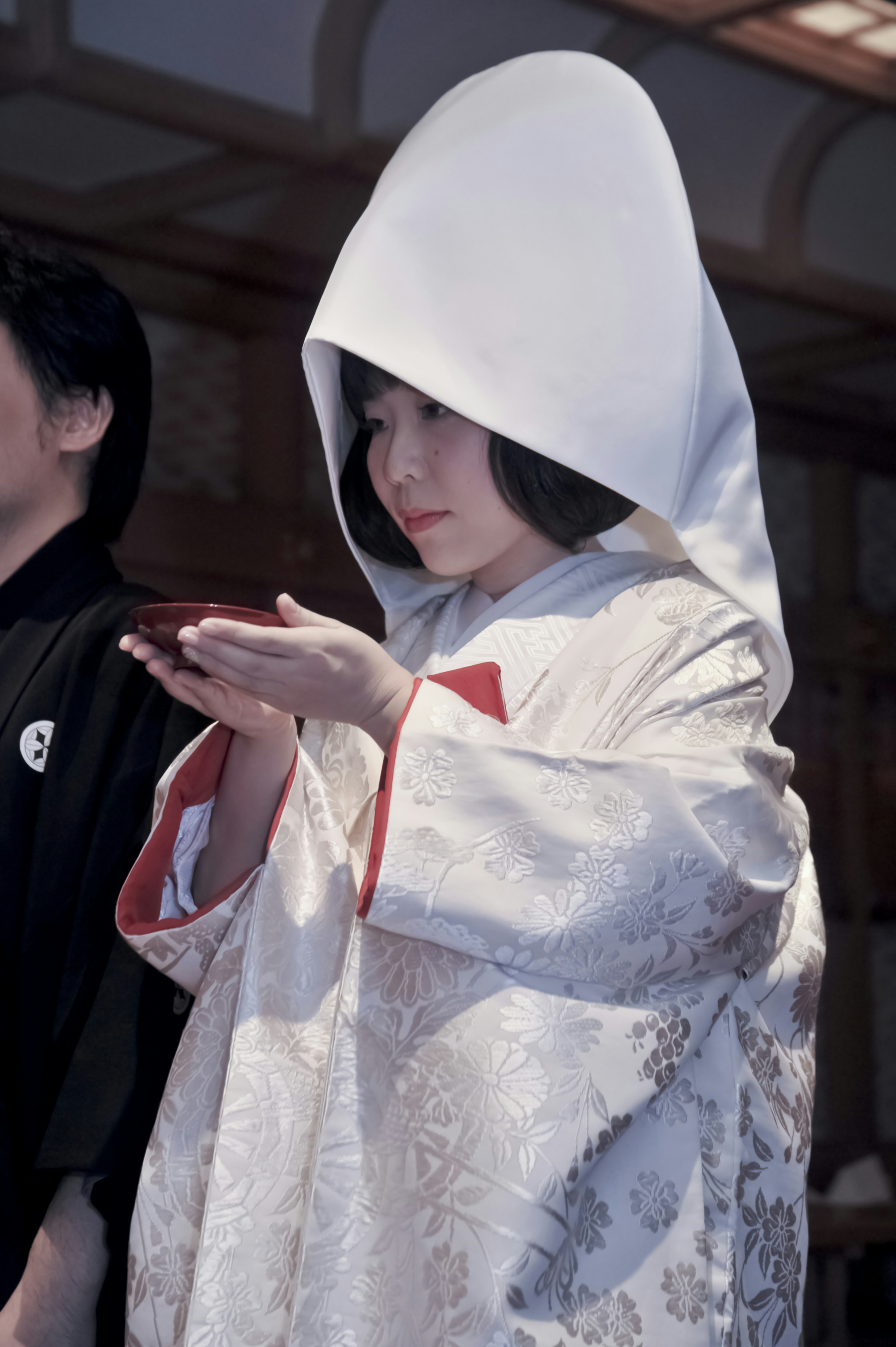 A woman in a white robe and a man in a black shirt photo – Free Natural ...