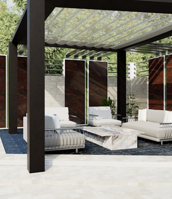 a white couch sitting under a wooden structure