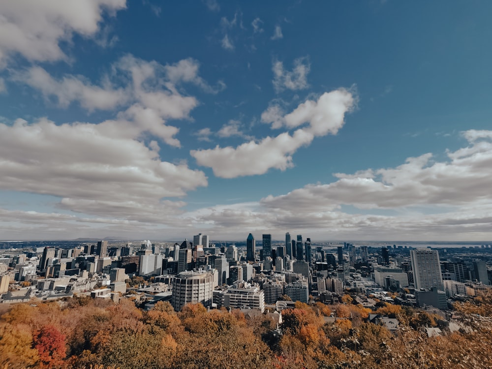 a view of a city from the top of a hill