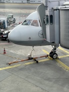 an airplane is parked on the tarmac at the airport