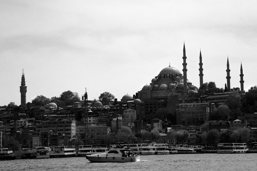 a black and white photo of a boat in the water