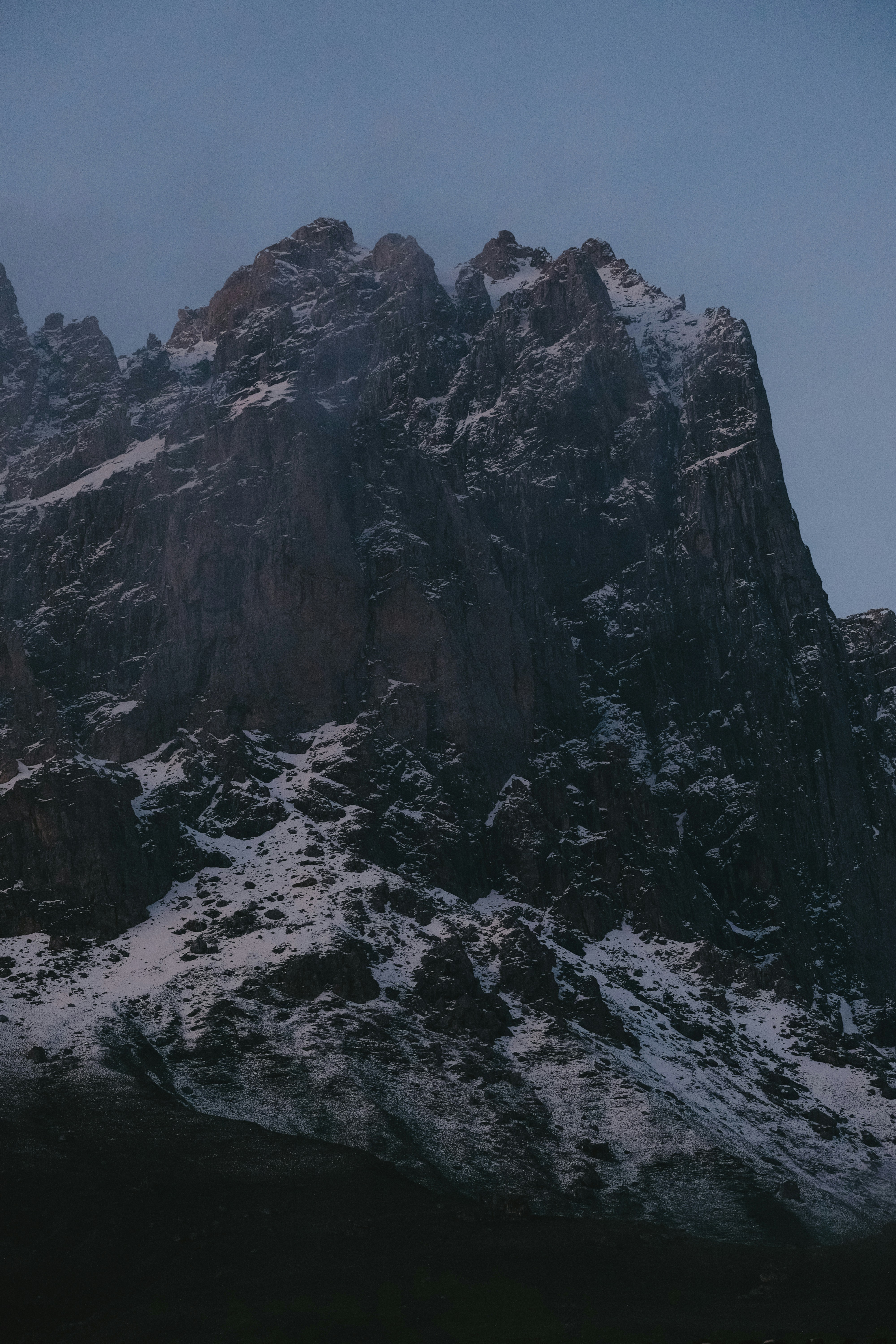 A large mountain covered in snow under a blue sky photo – Free Grey ...