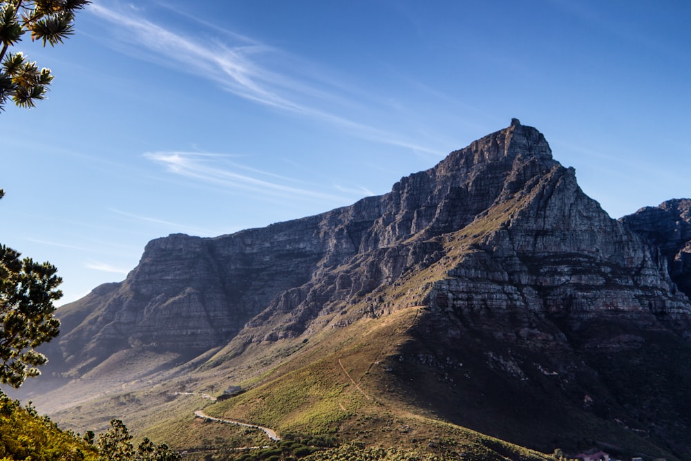 a view of a mountain with a road going through it