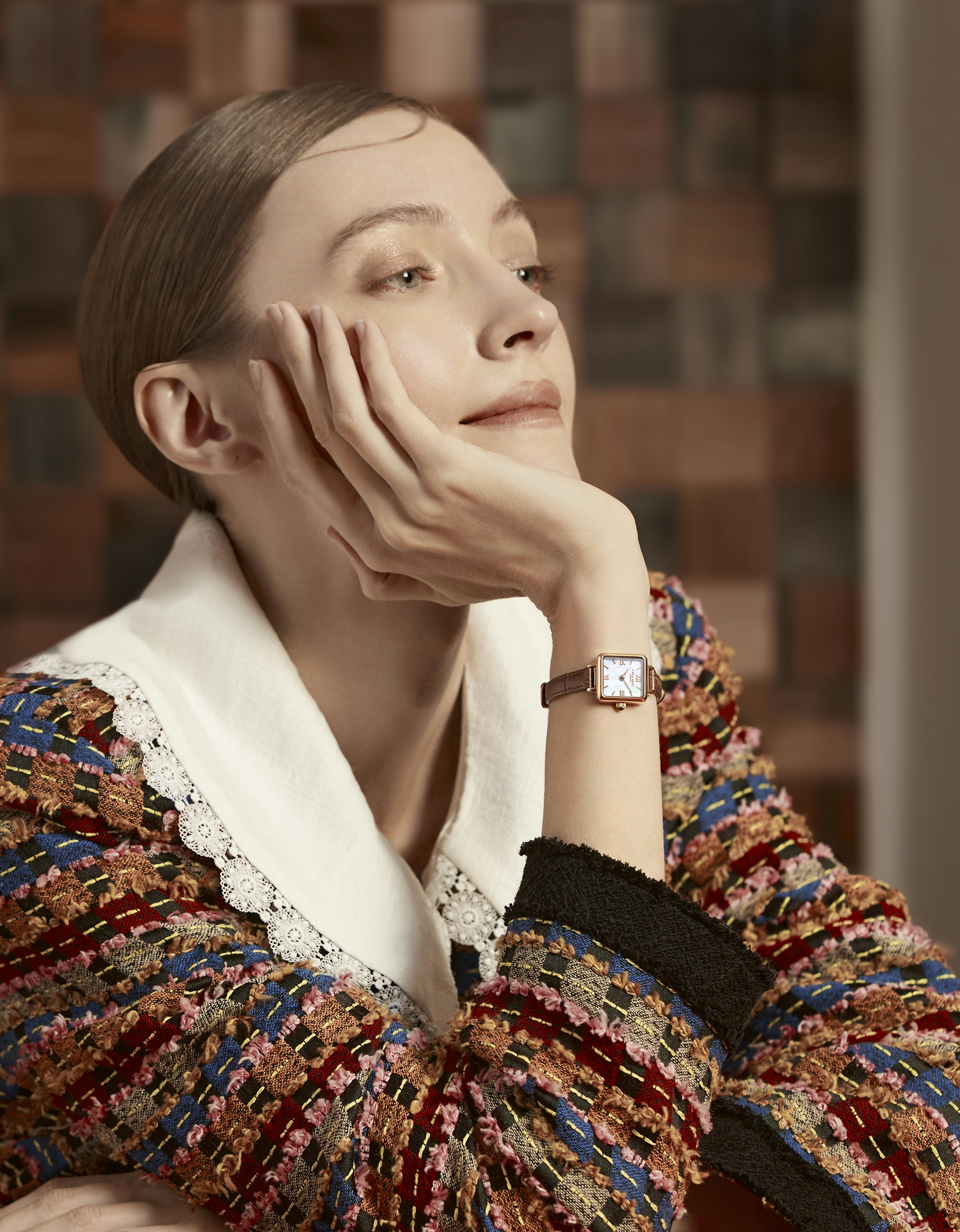 a woman with a watch on her wrist