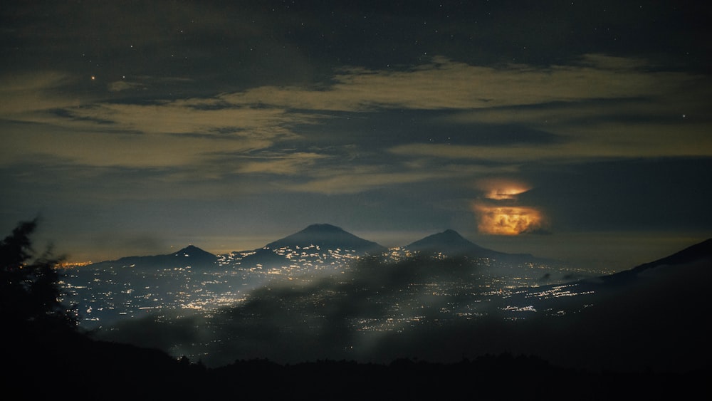 a view of a mountain range at night