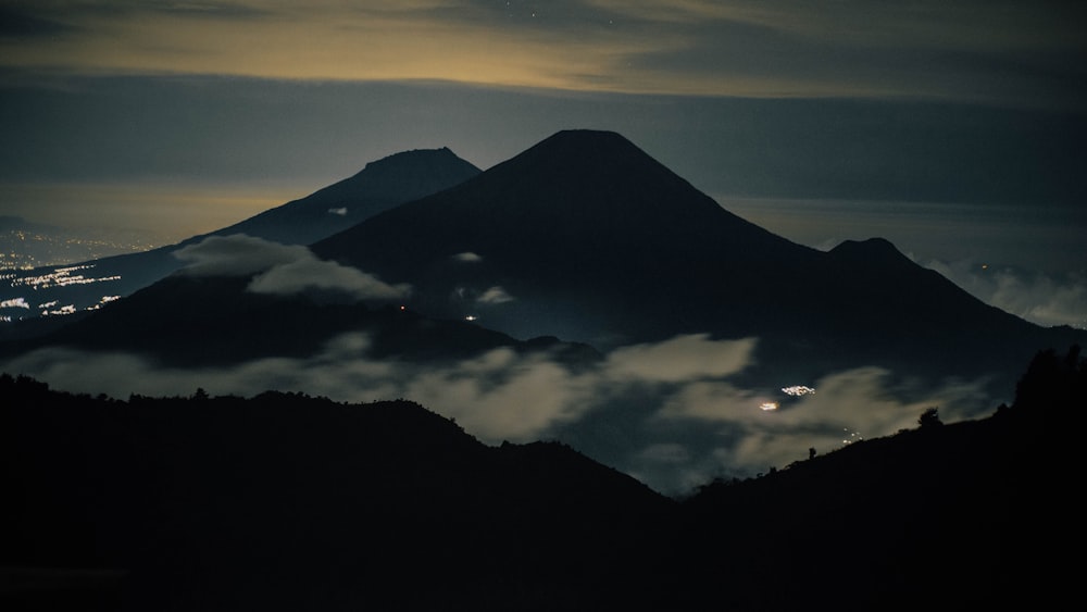 a view of the top of a mountain at night