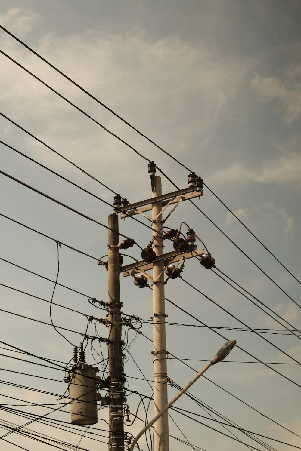 a pole with many wires and wires attached to it