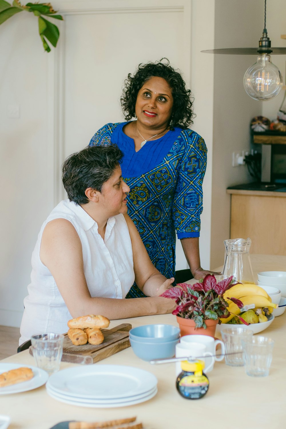 a man and a woman sitting at a table