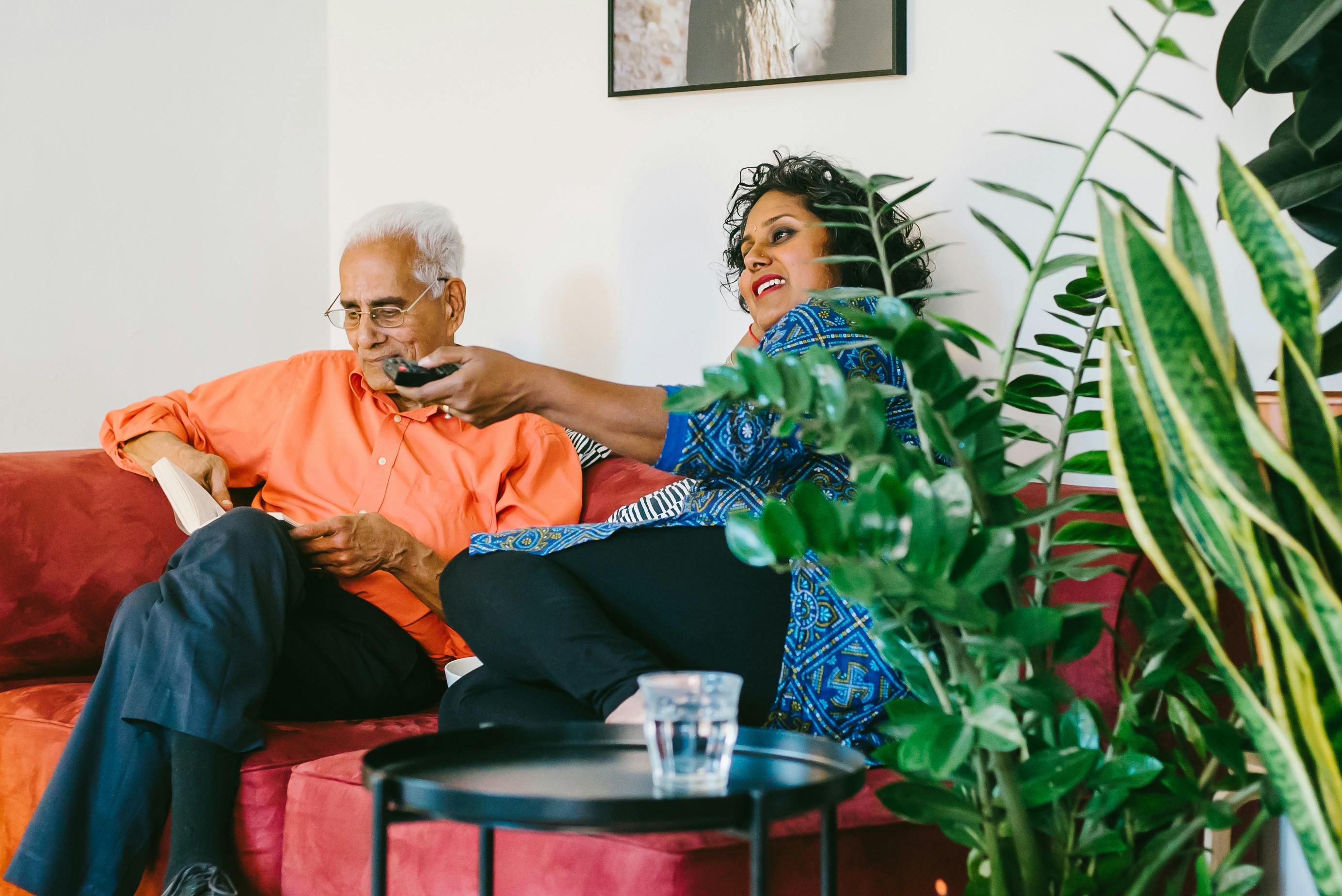 a man and a woman sitting on a couch