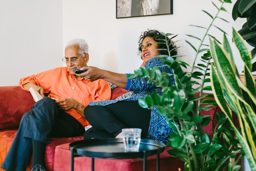 a man and a woman sitting on a couch