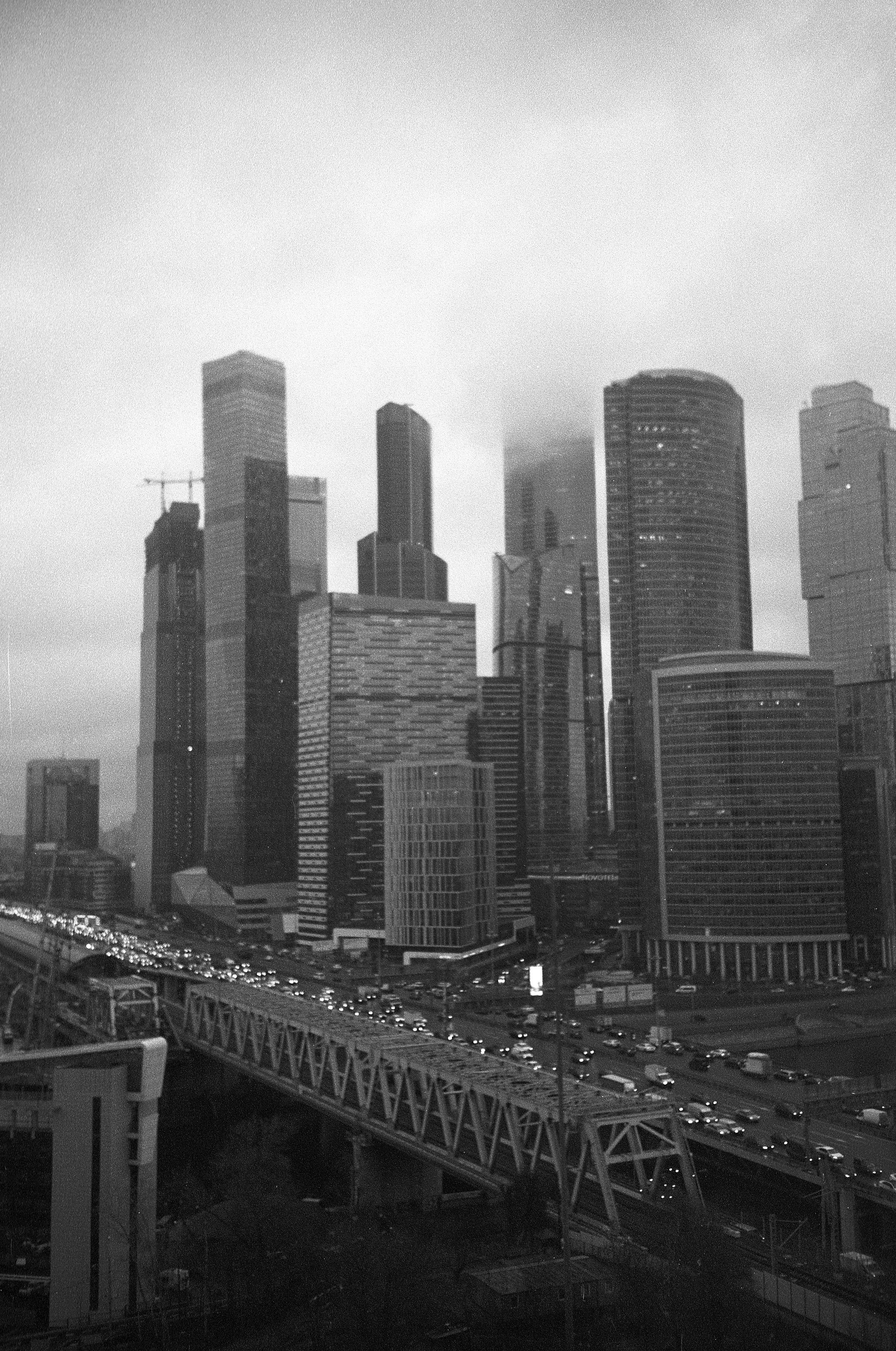 a black and white photo of a city skyline