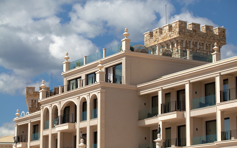 a large building with balconies and balconies on top