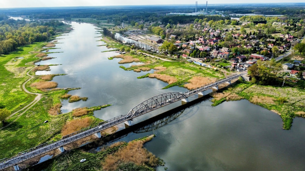 an aerial view of a bridge over a river