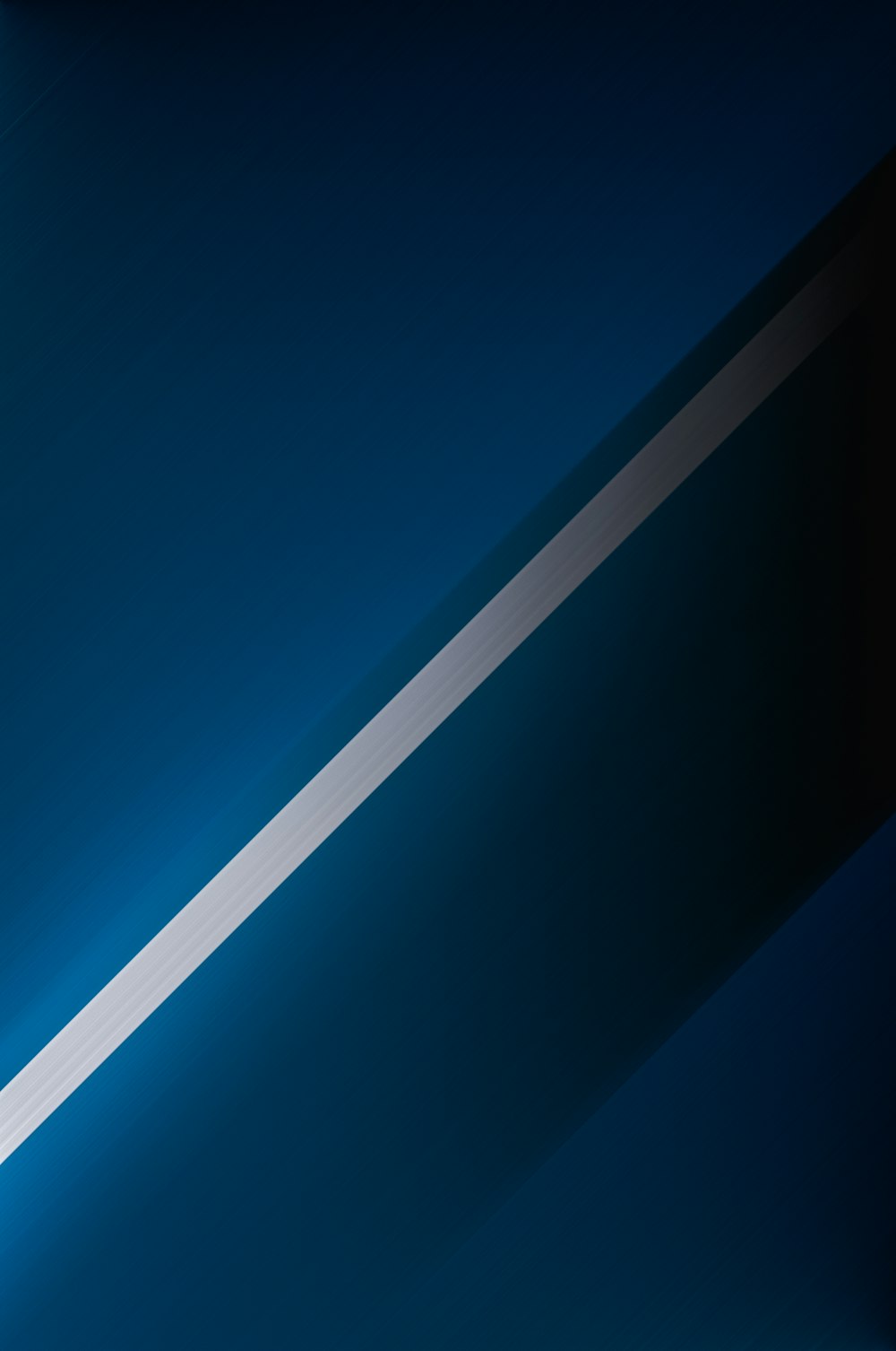 a blue wall with a white stripe on it