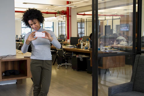 Corporate photography capturing candid moments in a modern office.