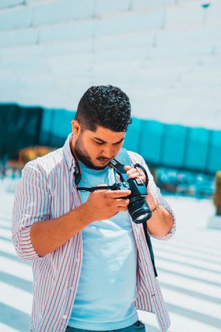 a man taking a picture with a camera