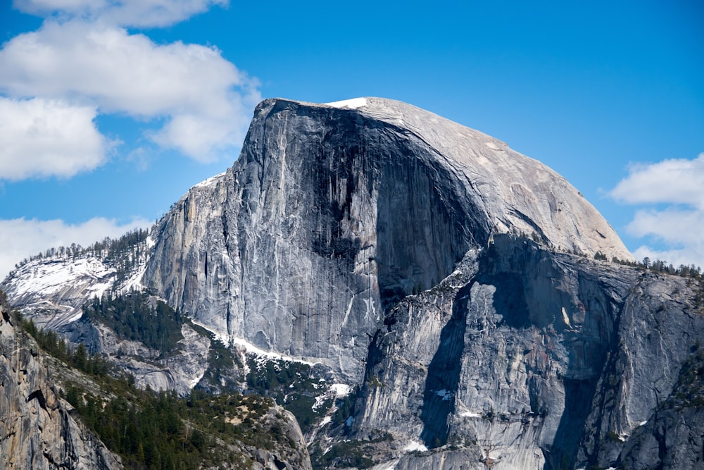 a large mountain with a snow covered top