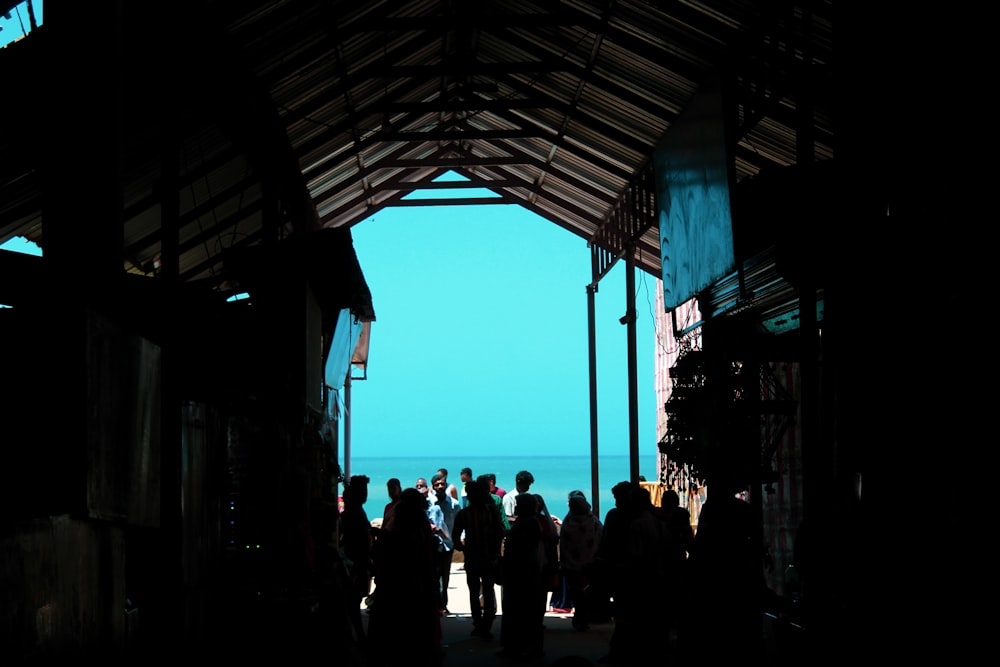 a group of people standing in a doorway