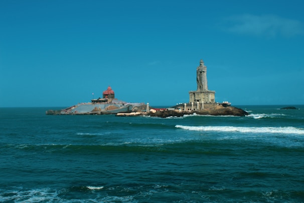 a lighthouse in the middle of the ocean