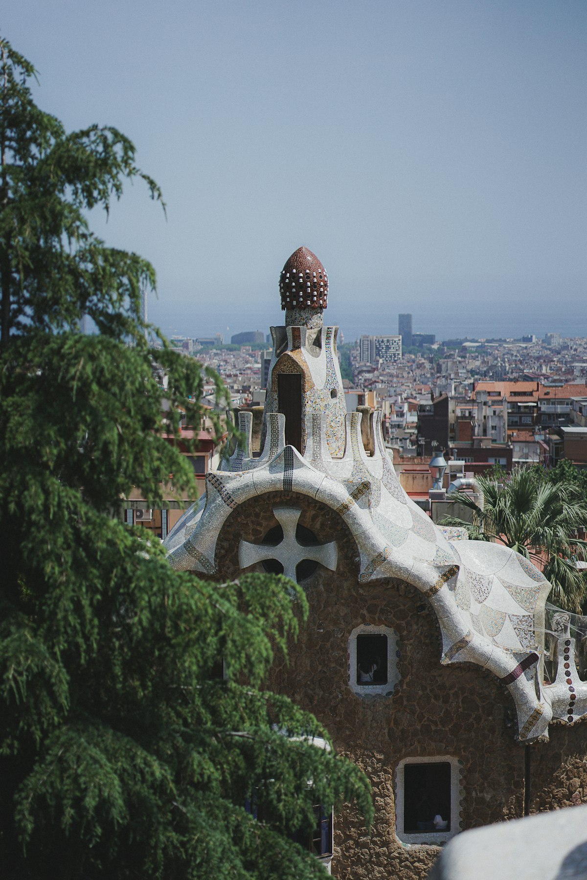 Panoramic rooftop view of Barcelona cityscape with historic buildings stretching to the horizon