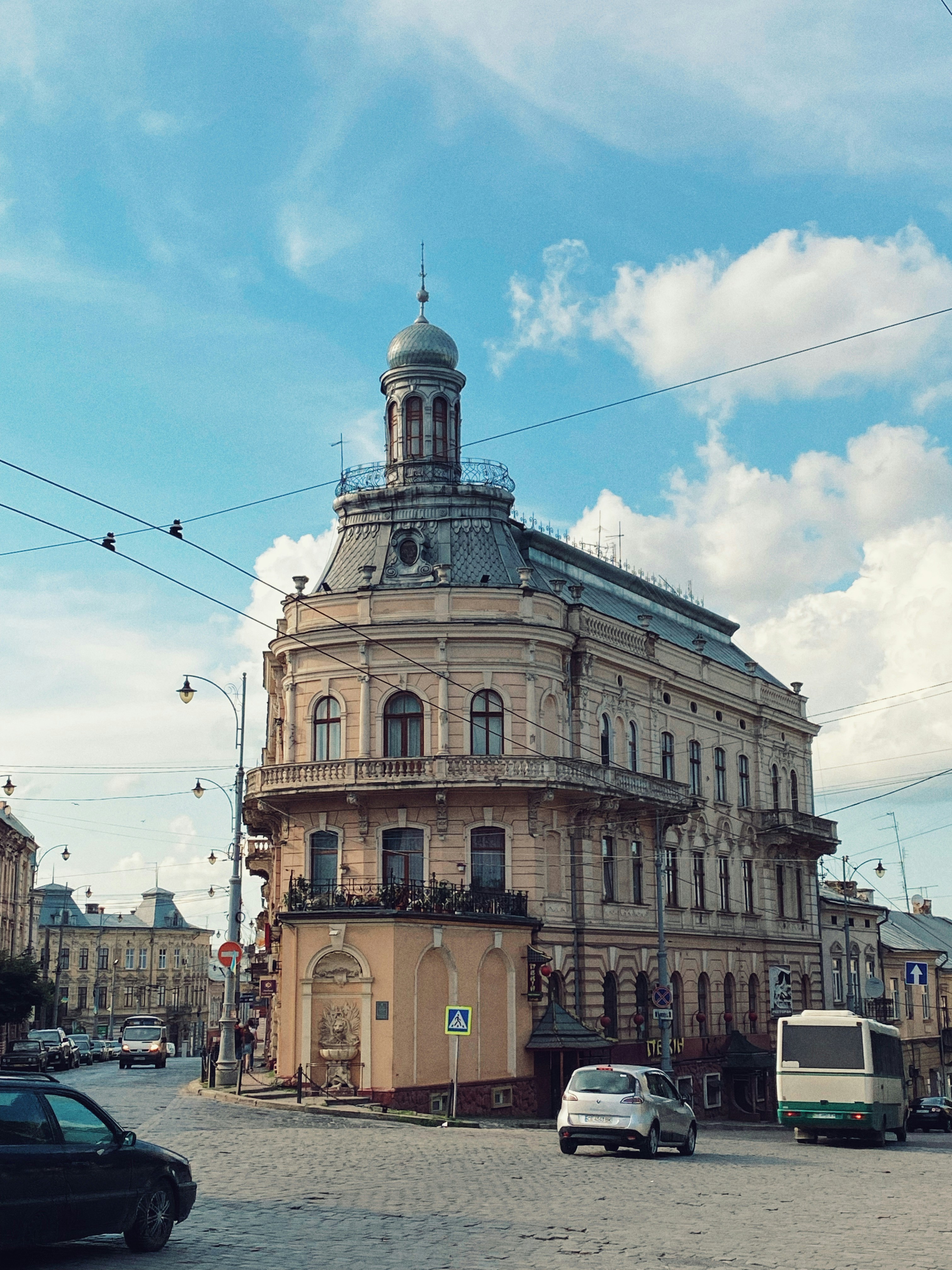 a large building with a clock on the top of it