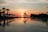 A serene view of a private pool at sunset in a luxury villa in Agadir.