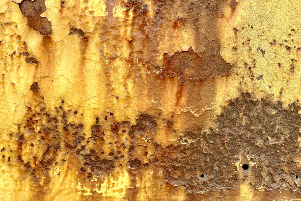 a close up of a rusted metal surface