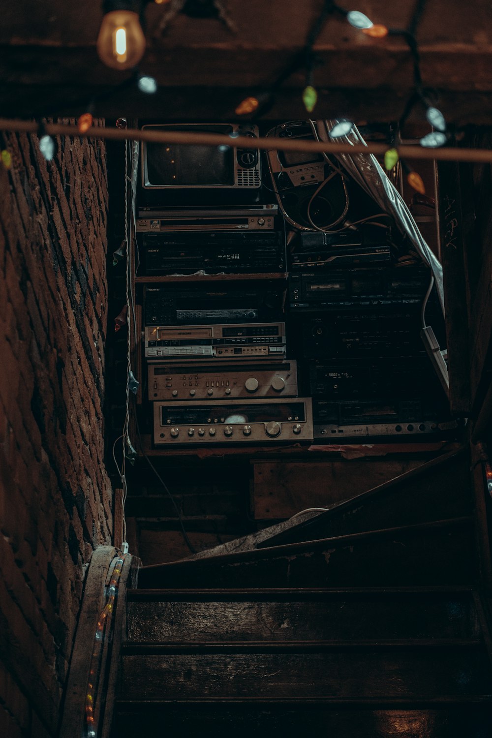a bunch of electronic equipment sitting on top of a set of stairs