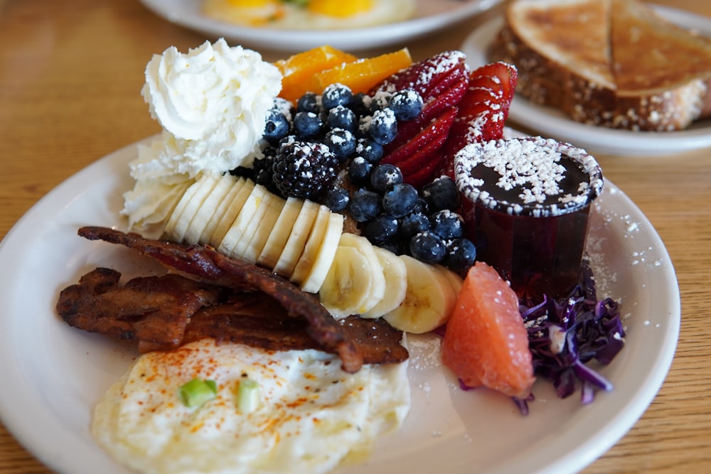 a white plate topped with different types of food