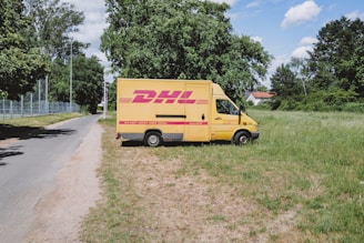 a dhl delivery truck delivering c43 amg tyres from tyrepublic in nigeria