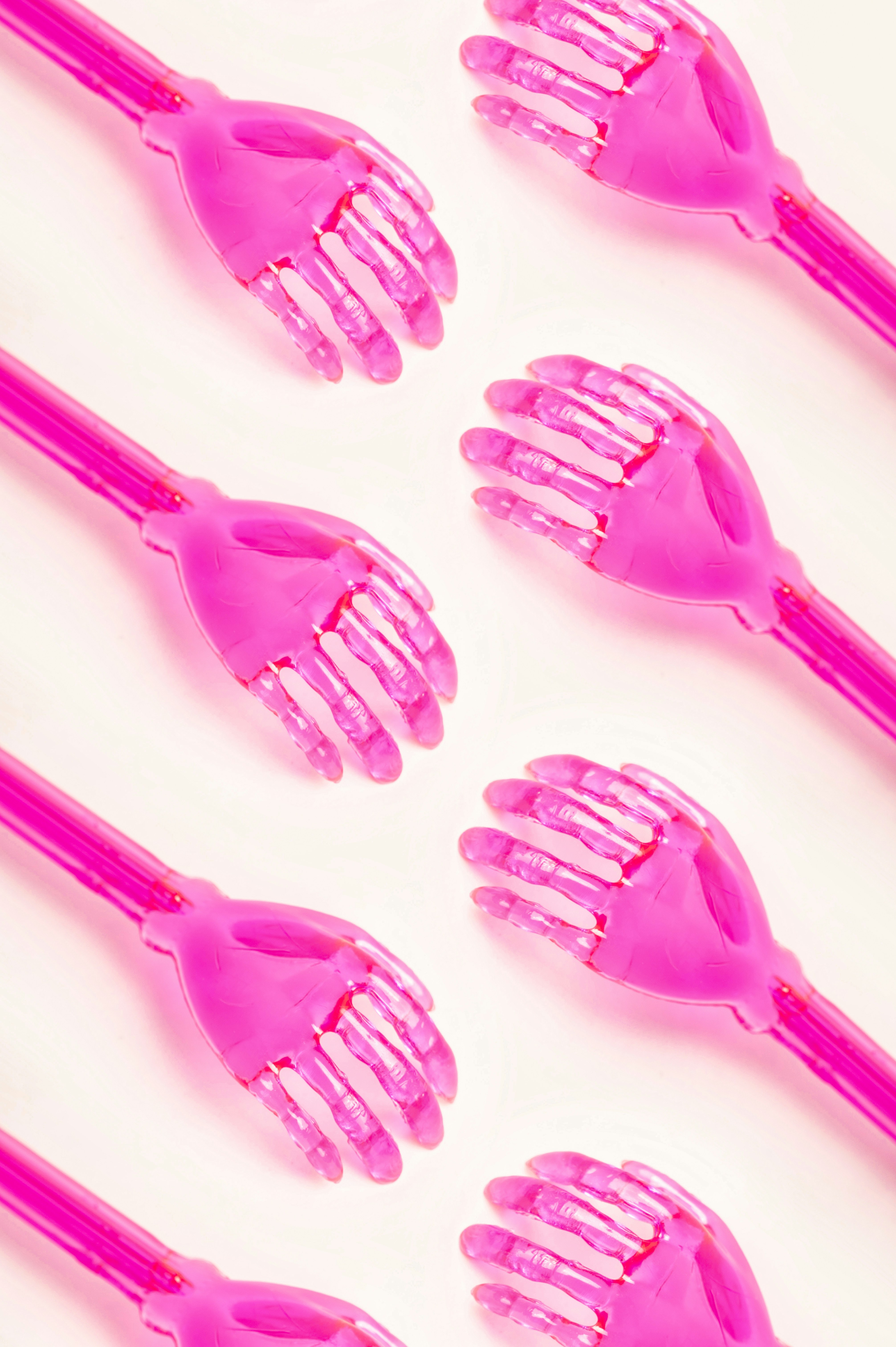 a close up of a bunch of pink combs