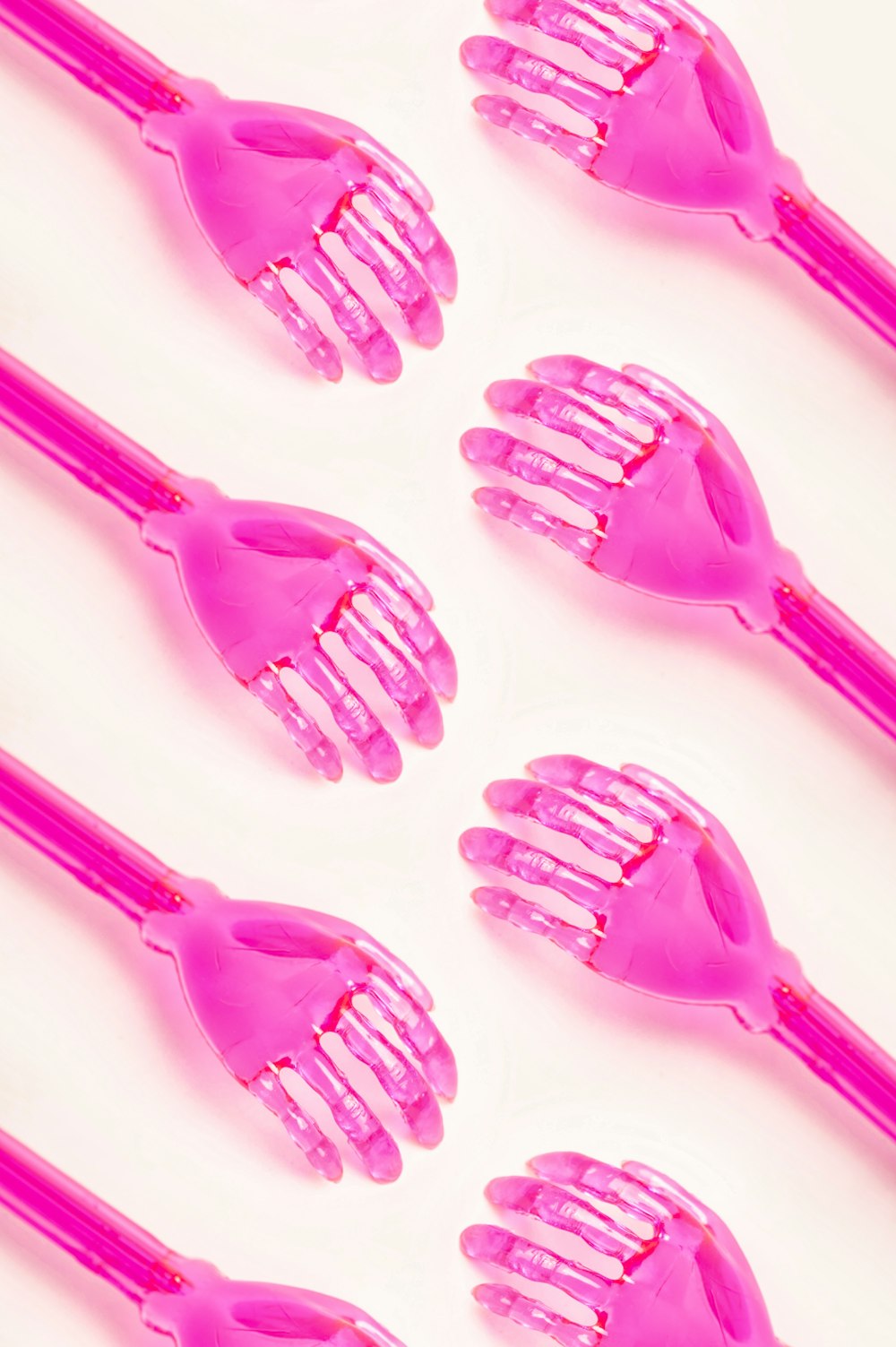 a close up of a bunch of pink combs