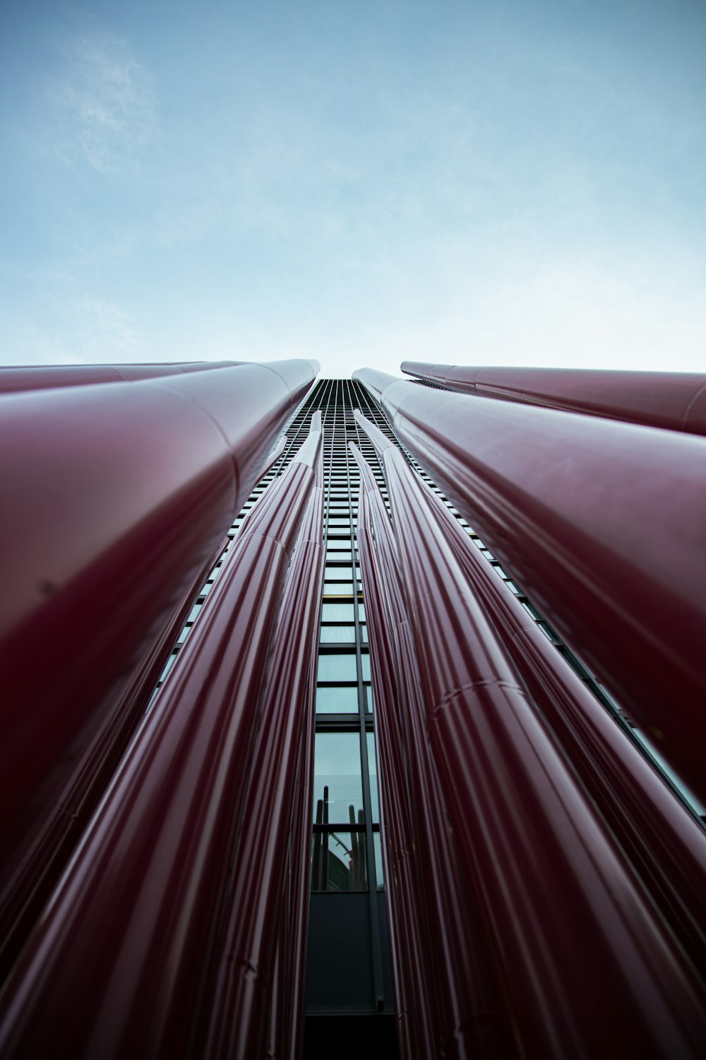 a very tall building with a sky in the background