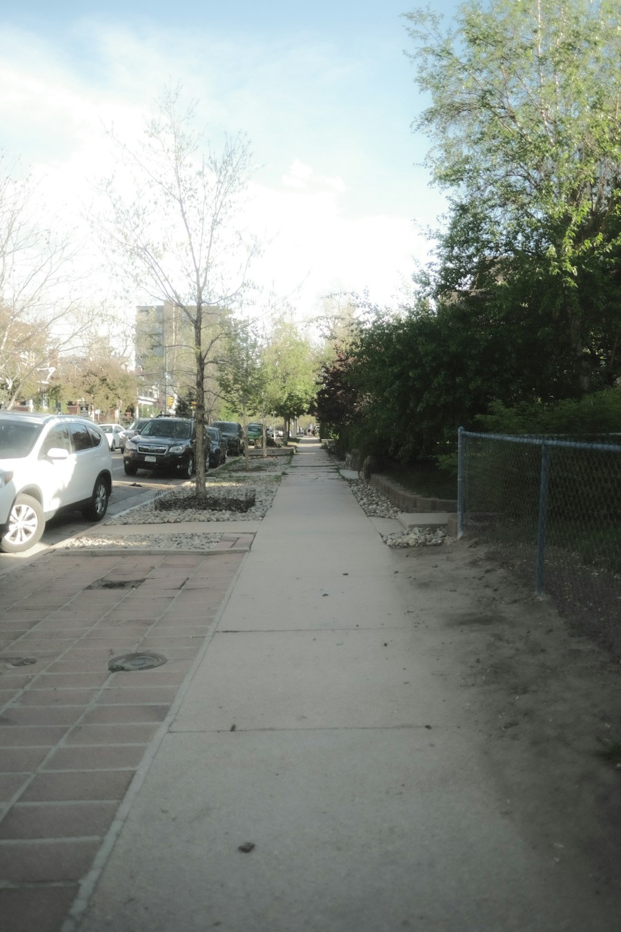 Sidewalk parked cars city