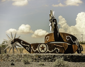 Local cultural artifact displayed against the natural backdrop of the Cuesta landscape