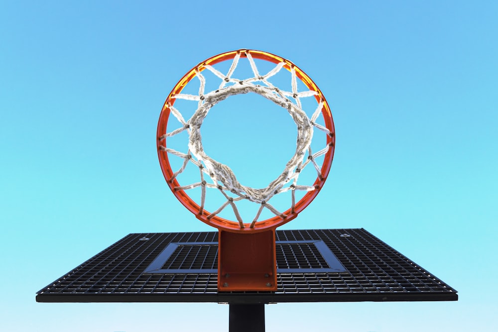 a basketball hoop on top of a solar panel