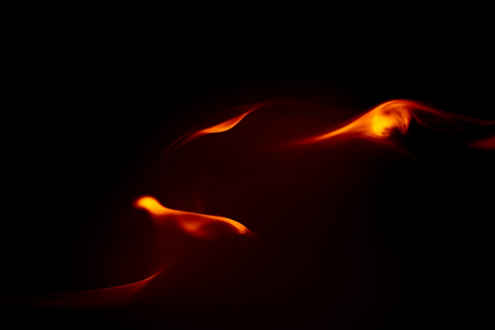 a black background with red and yellow flames