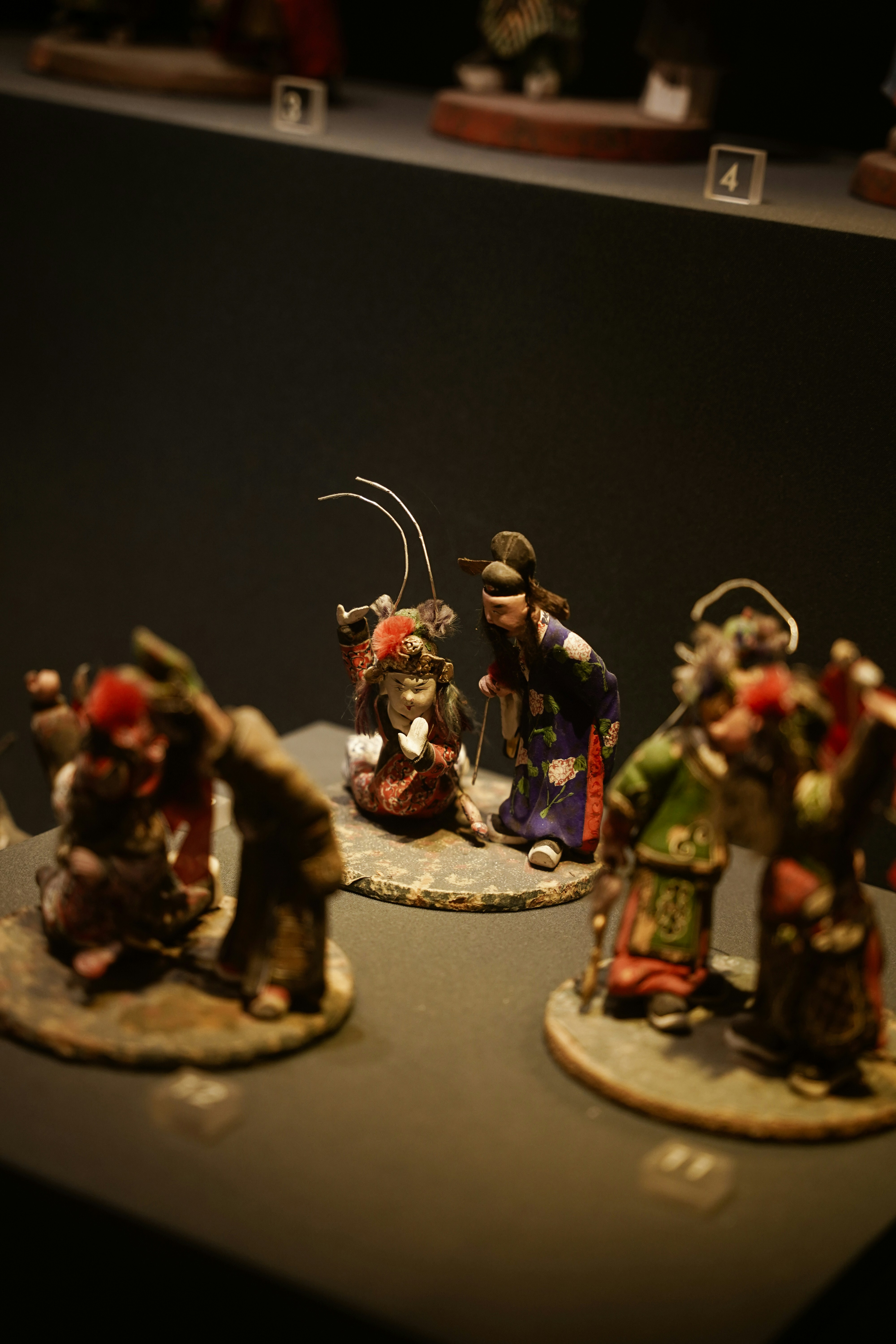 a group of figurines sitting on top of a table