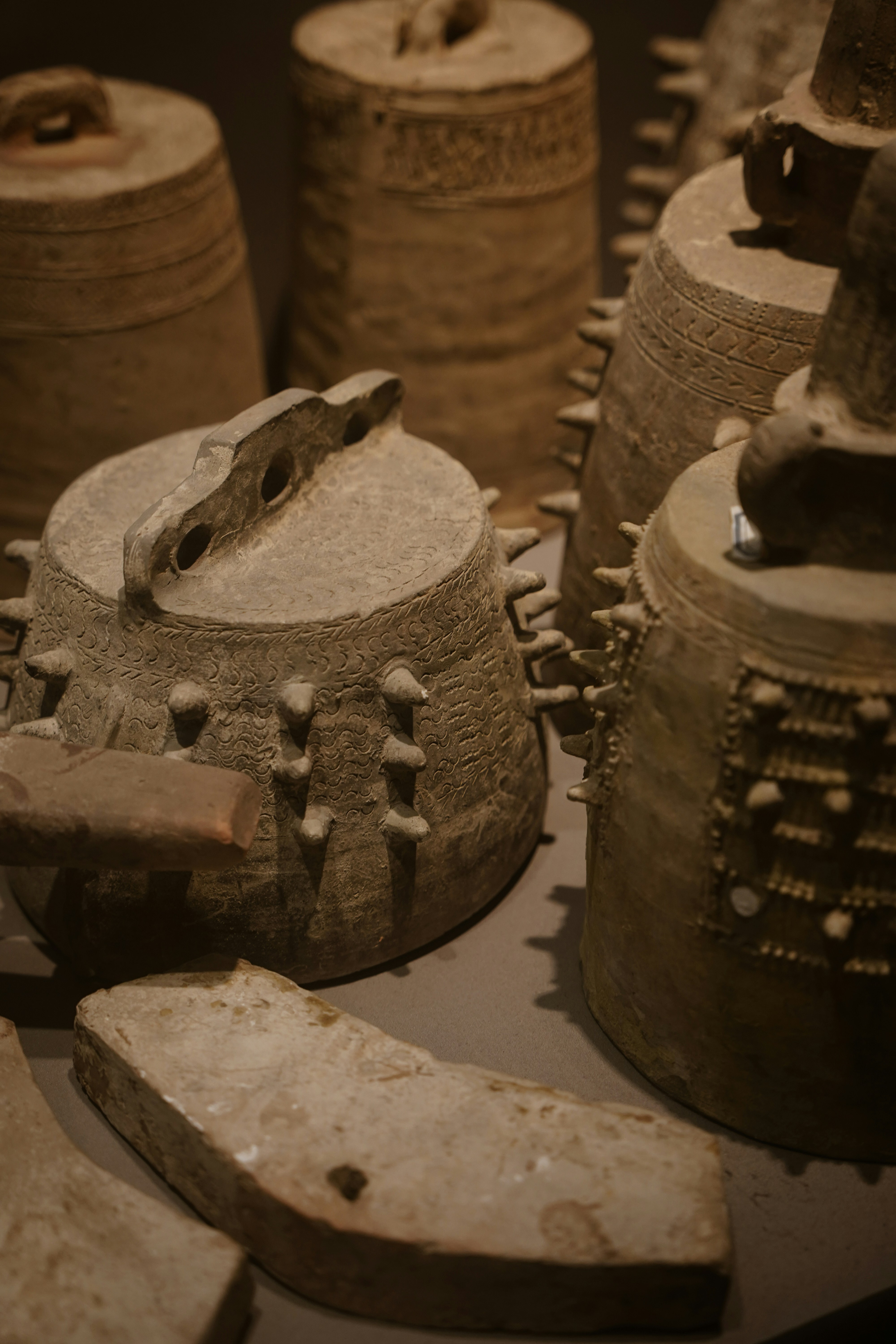 a group of clay pots sitting on top of a table