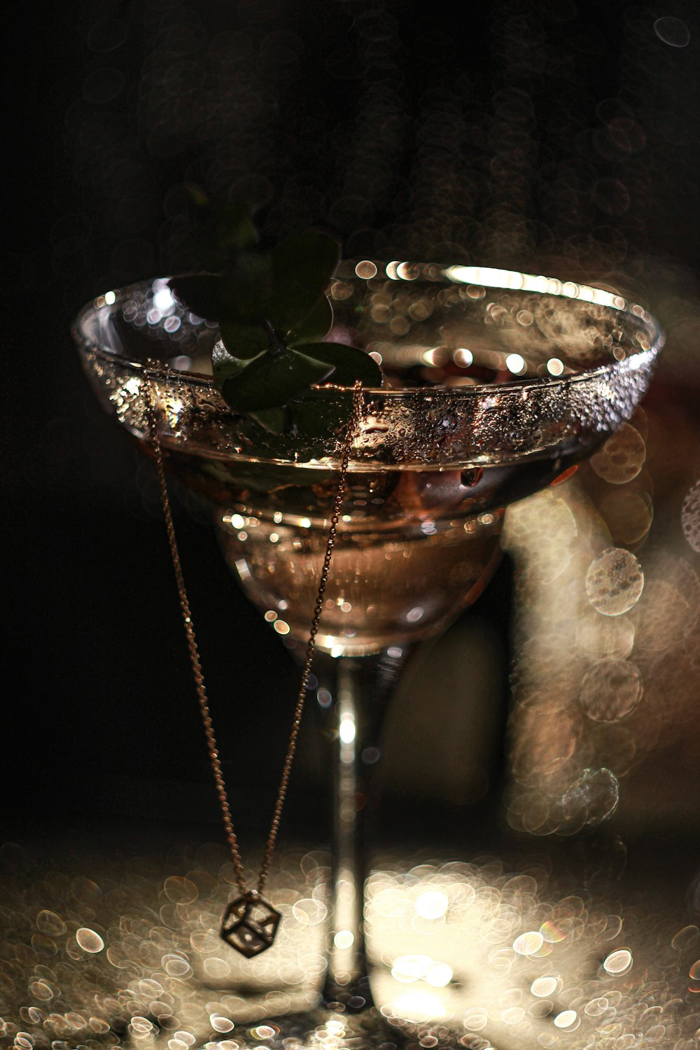 a close up of a drink in a glass on a table