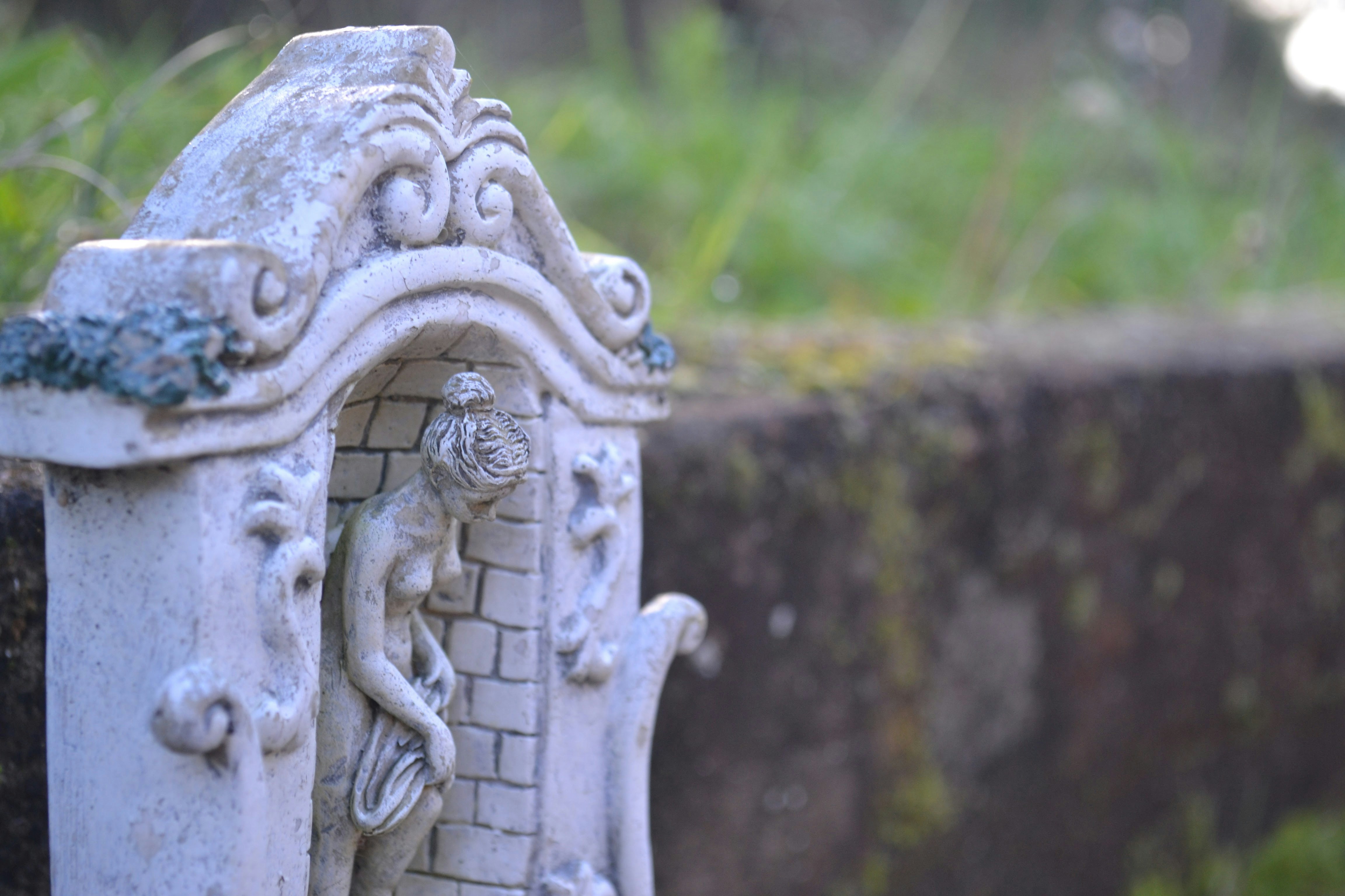 a close up of a statue of a woman