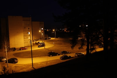Night shot of a ColorVu CCTV camera showing full-color footage of a residential street.
