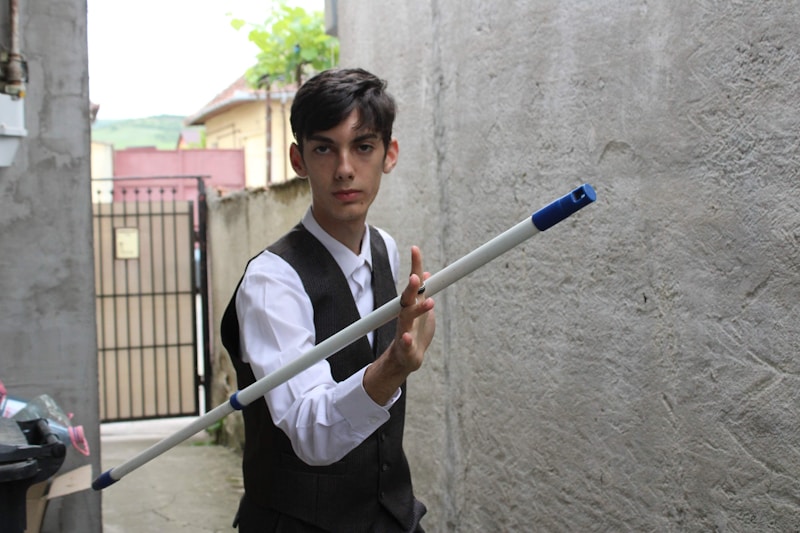 Young gentleman with umbrella
