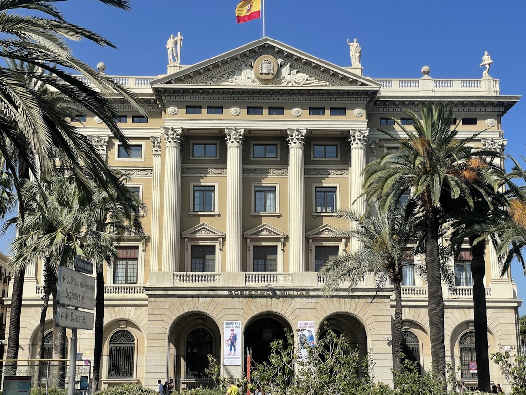 a large building with a flag on top of it, Gobierno Militar de Barcelona